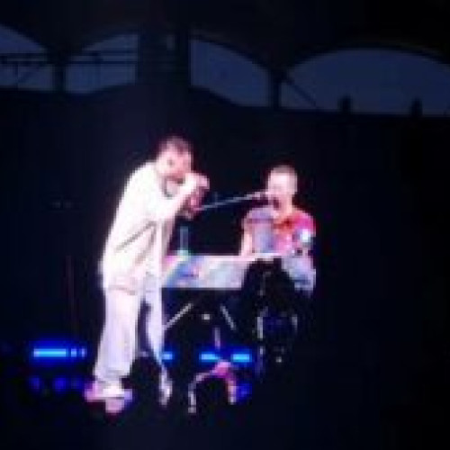Cântăreț de manele huiduit la concertul Coldplay de pe Arena Națională